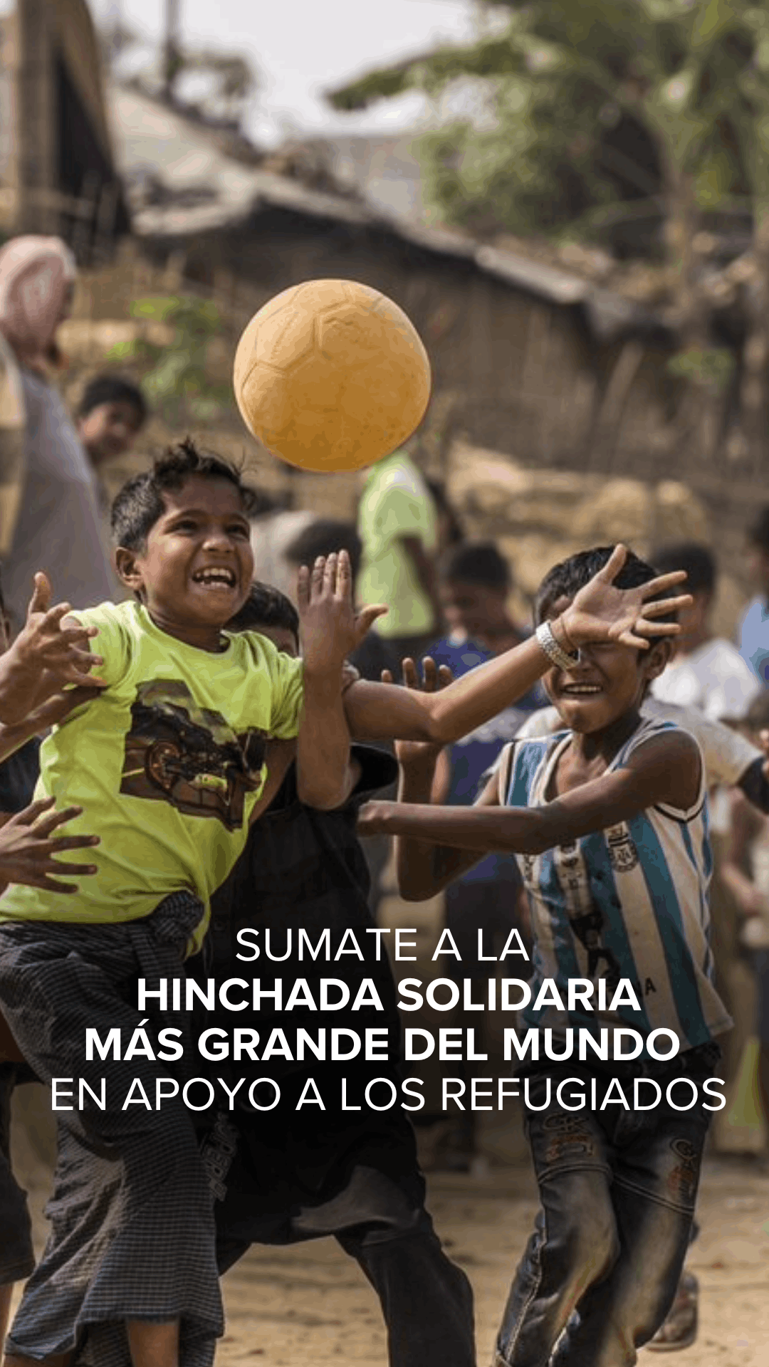 Children playing with a yellow ball outdoors, smiling and reaching for it during a lively game; banner text supports refugees.